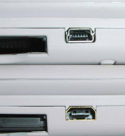 Side by side with original charging port and new USB port.
